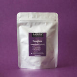 Envase Doypack plateado con etiqueta morada de Passiflora Amman Tea Blends para combatir ansiedad e insomnio, sobre fondo morado.
