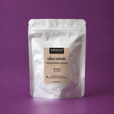 Envase doypack de Anís Estrella Amman Tea Blends de 50g para fortalecer defensas sobre fondo morado.
