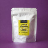 Envase doypack de Flores de Manzanilla de Amman Tea Blends sobre fondo violeta.